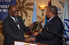 Ambassador John W. Ashe, Permanent Representative of Antigua and Barbuda to the UN, receiving an Appreciation Award from the Honourable W. Baldwin Spencer, Prime Minister and Minister for Foreign Affairs of Antigua and Barbuda and Chair of the G-77.